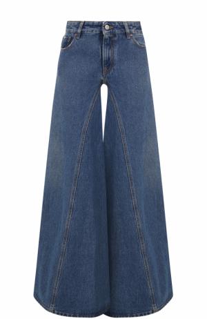 Расклешенные джинсы с потертостями Mm6. Цвет: темно-синий