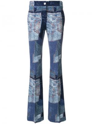 Джинсовые брюки клеш в стиле пэчворк Moschino. Цвет: синий