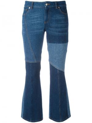 Расклешенные джинсы с контрастными панелями Alexander McQueen. Цвет: синий