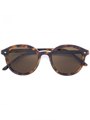 Солнцезащитные очки в круглой оправе Giorgio Armani. Цвет: коричневый