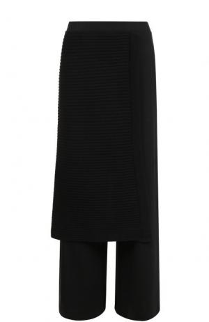 Шерстяные расклешенные брюки Yohji Yamamoto. Цвет: черный