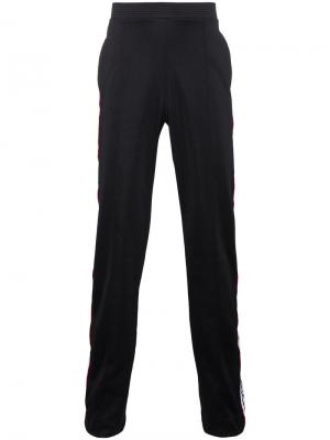 Спортивные брюки с логотипом на контрастных полосках Givenchy. Цвет: чёрный