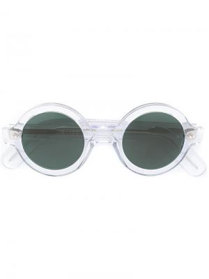 Солнцезащитные очки в круглой оправе Cutler & Gross. Цвет: телесный