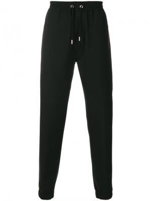 Спортивные брюки с лампасами Givenchy. Цвет: чёрный