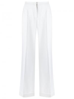 Расклешенные строгие брюки Dolce & Gabbana. Цвет: белый